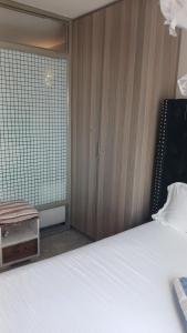 En eller flere senge i et værelse på Tsavo Brian