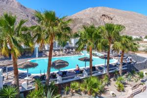 an aerial view of the resort with palm trees at Sandy's Paradise- Adults Only in Perissa