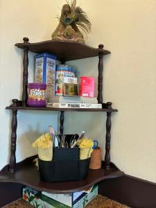 a shelf with food and other items on it at The Barn House in Eureka Springs +27 photos
