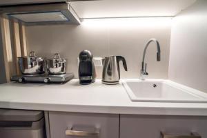 Eldhús eða eldhúskrókur á Preveza Suitestay Apartments Dodonis 28 +16 myndir