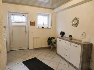 Kuchyň nebo kuchyňský kout v ubytování Ferienwohnung Kleine Oase