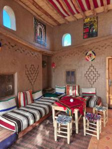 Rúm í herbergi á Eco-Ferme Tamalait Skoura