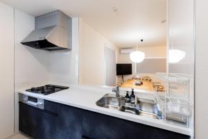 Køkken eller tekøkken på HAJIME STAY KASUGA 4 - Vacation STAY 85892v