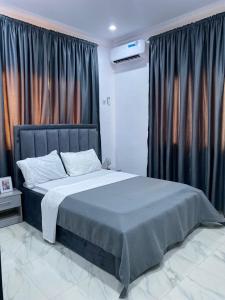 Una cama o camas en una habitación de Rachel's Place