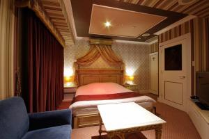 TV a/nebo společenská místnost v ubytování Hotel Pharaoh-Adult Only