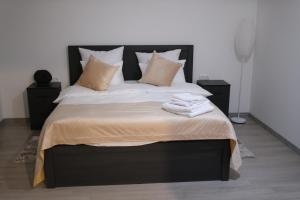 Giường trong phòng chung tại Eraz Guest House