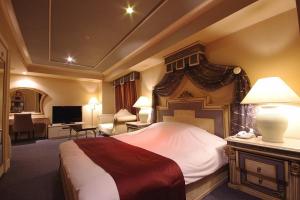 Postel nebo postele na pokoji v ubytování Hotel Pharaoh-Adult Only