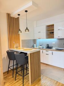 Кухня или мини-кухня в Prestige Forest Resort Zlatibor Wellness & Spa
 +69 фотографий