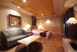 TV a/nebo společenská místnost v ubytování Hotel Pharaoh-Adult Only