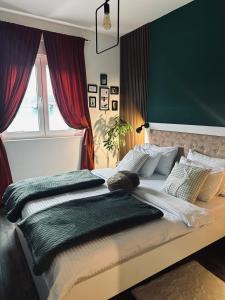 Ένα ή περισσότερα κρεβάτια σε δωμάτιο στο Apartman Viktorija