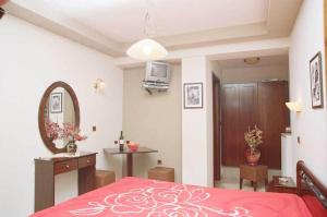 Postel nebo postele na pokoji v ubytování Guesthouse Irida