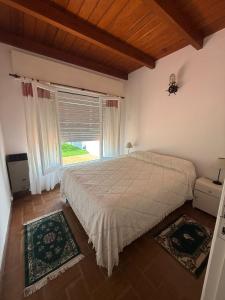 Postel nebo postele na pokoji v ubytování CASA El CORRALÓN