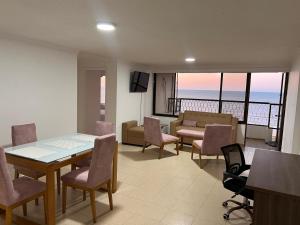 Et opholdsområde på R11 Riohacha lindo, cómodo y seguro apartamento con balcón mirando el mar
