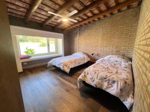 En eller flere senge i et værelse på La piu Bella