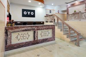 Un certificado, premio, letrero u otro documento en HOTEL O 4 SQUARE A LUXURY ROOMS NEAR RDC MAIN MARKET