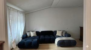 Et opholdsområde på Riflesso - deluxe apartment - super central - only real beds - wifi airco TV65