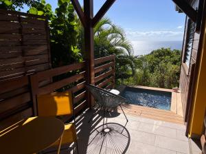 Swimmingpoolen hos eller tæt på PomKouli - Les lodges Racines é Zel + 32 billeder