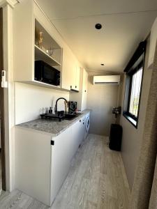 Køkken eller tekøkken på Tiny house 3 à 4 personnes