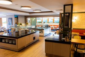 Nhà hàng/khu ăn uống khác tại private apartment in a five-star hotel in Bansko