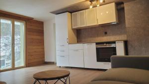 Kuchyň nebo kuchyňský kout v ubytování Aletsch Arena Fieschertal FeWo - 2 Zimmer + 17 fotografií