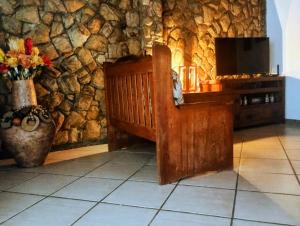 TV a/nebo společenská místnost v ubytování Aconchegante pé na lagoa