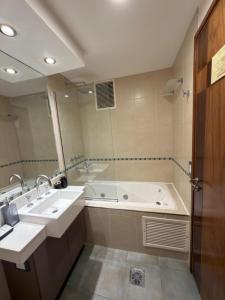 Et badeværelse på Del Bono Suites