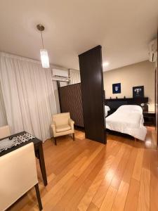 En eller flere senge i et værelse på Del Bono Suites + 7 billeder