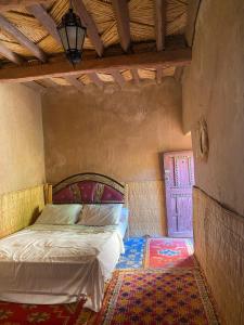 En eller flere senge i et værelse på Auberge sahnoun
