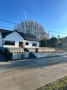 a house on the side of the road at Inspire Residence and private Wellness in Tongeren