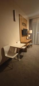 TV a/nebo společenská místnost v ubytování Apartament Czarna Góra Blue