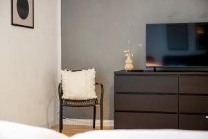 Et tv og/eller underholdning på LAHNBLICK 3 Schlafzimmer, Parkplatz, WLAN