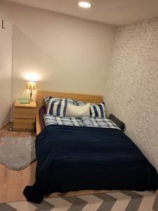 Кровать или кровати в номере Wolfs Studio