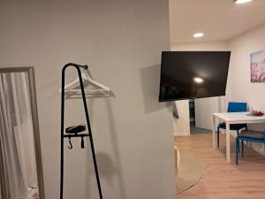 Телевизор и/или развлекательный центр в Wolfs Studio