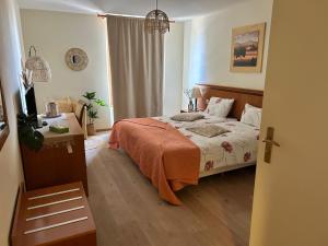 Postel nebo postele na pokoji v ubytování Auberge de Gilly SA