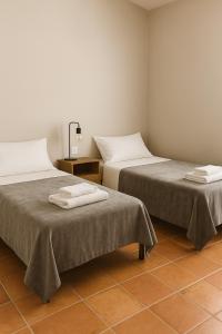 Postel nebo postele na pokoji v ubytování Can Ricart