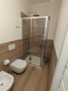 a bathroom with a shower and a toilet at Il Boschetto della Valle Maira in Villar San Costanzo +17 photos