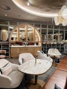 a room with a table and chairs in a store at Bella Vista at Ellipse in Midrand