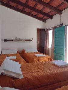 En eller flere senge i et værelse på El Rincón de las Palmas