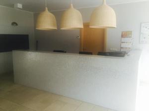 Kuchyň nebo kuchyňský kout v ubytování Biały Apartament Hampton w Playa Baltis