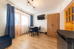 Et tv og/eller underholdning på Apartamenty Podmuch Halnego