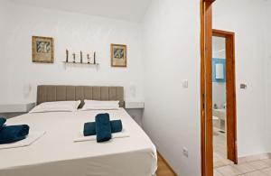 Кровать или кровати в номере Vila Zagora +70 фотографий