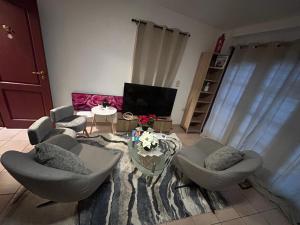 Una televisión o centro de entretenimiento en Apartchrisbea