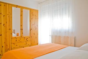 Posteľ alebo postele v izbe v ubytovaní Apartment Annika