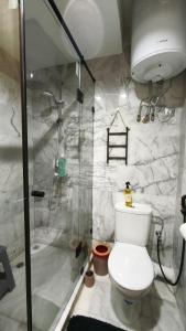 Ένα μπάνιο στο Appartement Chaleureux à Bouznika- Plage Oued Cherrat - à 30min de Rabat 1chambre 1 salon +8 φωτογραφίες