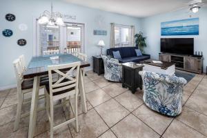 Et tv og/eller underholdning på Sunset Cottages 2B Pet friendly condo