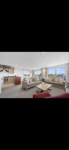 Postel nebo postele na pokoji v ubytování Cutterscove Resort Apartments