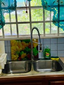 Køkken eller tekøkken på The Bon Accord Beach House + 29 billeder