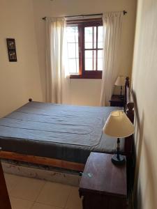 En eller flere senge i et værelse på La Lucila del Mar Duplex