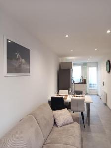 Posezení v ubytování Appartement équipé vue phare, 2 min plage & ferry