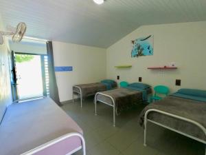 Postel nebo postele na pokoji v ubytování Auberge de Poé